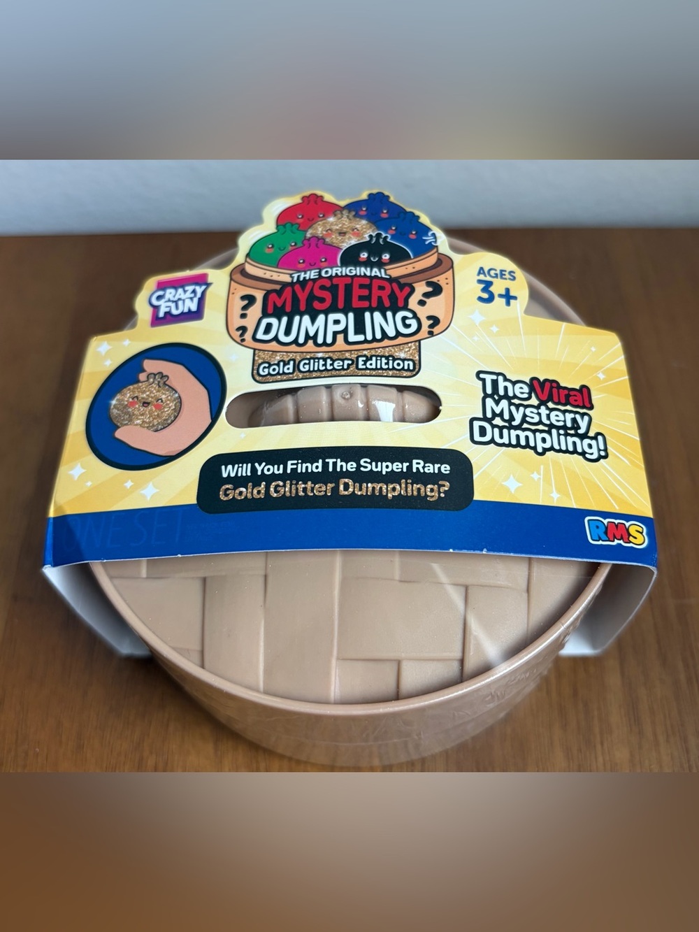 RMS Crazy Fun The Original Mystery Dumpling Gold Glitter Edition Squishy Bun